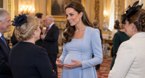 Kate Middleton meeting guests during a royal engagement while pregnant